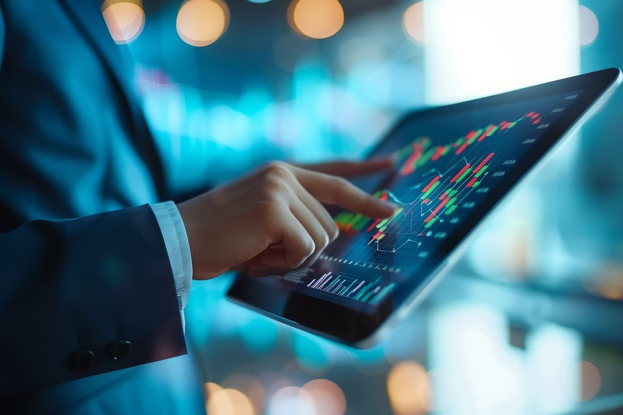 Person looking at stocks on a tablet