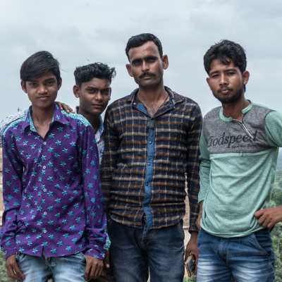 four men standing