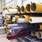 rolls of cloth at a factory