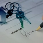 paper work with pen and keys